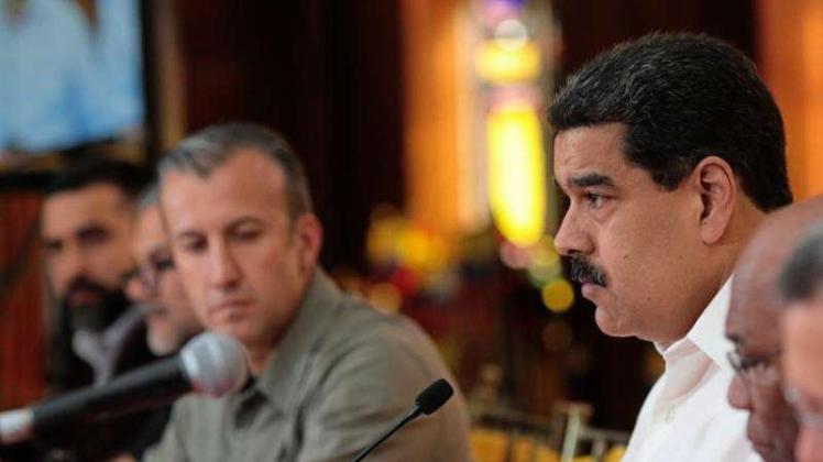 Venezuelas Vizepräsident Tareck El-Aissami (l) und Präsident Nicolás Maduro am Dienstag in Caracas. 