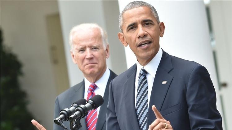 Barack Obama (rechts) und sein Vize Joe Biden vor dem Weißen Haus. 