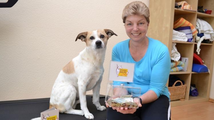 Die Streunerhilfe in Delmenhorst plant eine Spendenaktion zu Ostern. Im Bild ist die Vorsitzende Kirsten Glage mit Hund Felix zu sehen. Archivfoto: Britta Buntemeyer
