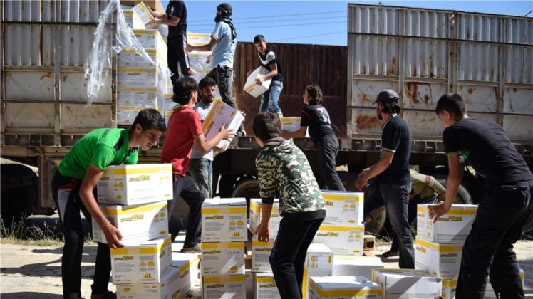 Die syrische Regierung hat humanitären Helfern für Hilfslieferungen unbeschränkten Zugang zu zwölf belagerten Städten genehmigt. Symbolfoto: AFP