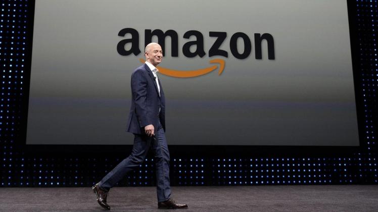 Amazonchef Jeff Bezos kann sich über erfreuliche Börsenwerte freuen. Foto: dpa/Michael Nelson