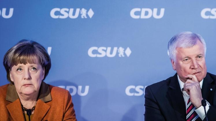 Angela Merkel (CDU) lehnt im Gegensatz zu Horst Seehofer (CSU) einen nationalen Alleingang in der Flüchtlingspolitik ab.