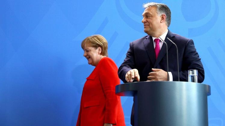 Viktor Orban in Berlin: Beim Besuch der Kanzlerin war dem Ungarn wohl bewusst, dass seine rigide und in Deutschland gern gescholtene Grenzpolitik den Flüchtlingsandrang nach Deutschland deutlich mindert. Foto: AFP/Omer Messinger