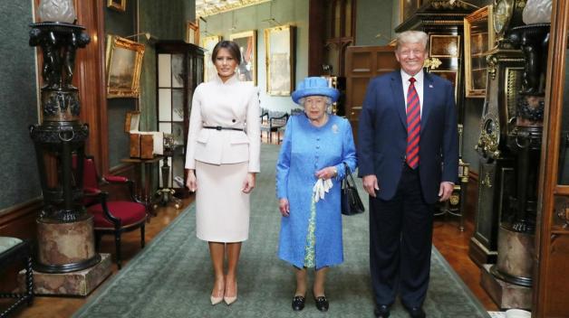 Donald Trump, First Lady Melania Trump und die britische Königin Elizabeth II in Schloss Windsor. Foto: Steve Parsons/PA Wire/dpa