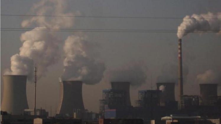 Kraftwerk in Tianjin: China stößt weltweit mit Abstand am meisten Treibhausgase aus. Foto: How Hwee Young/Archiv