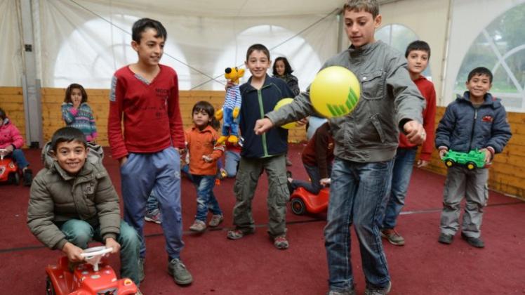 Flüchtlingskinder in Meppen spielen vergnügt. Archivfoto: Carola Alge