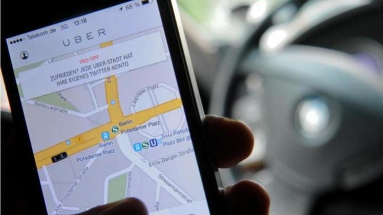 Fahrdienstvermittler Uber will in einige deutsche Städte zurückkehren. 