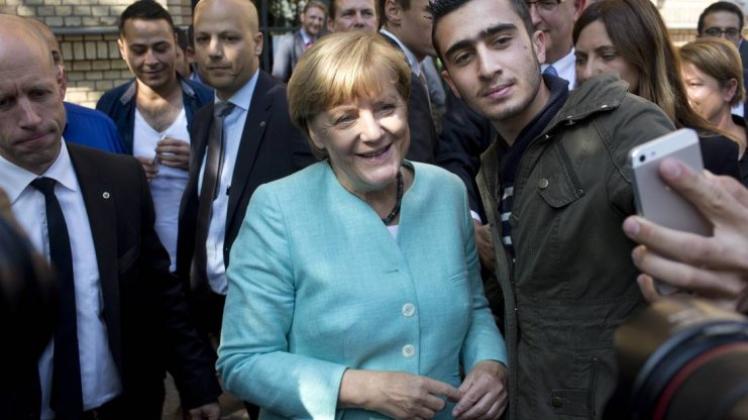 Auf dem CDU-Parteitag in Karlsruhe wird es auch um Angela Merkels Flüchtlingspolitik gehen. 