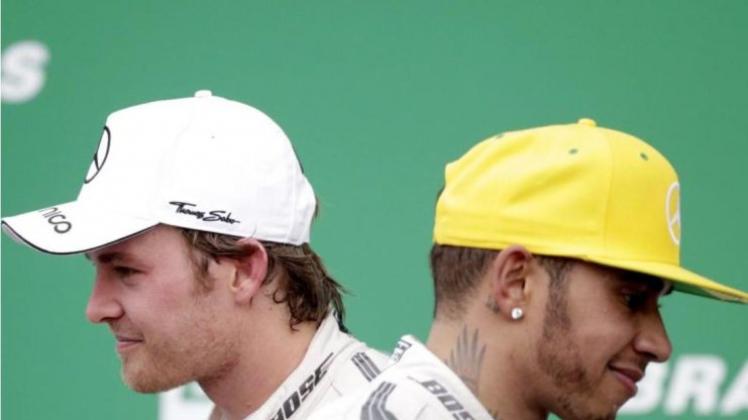 Zwischen Nico Rosberg (l) und seinem Stallkollegen Lewis Hamilton (r) herrscht eine starke Rivalität. Foto: Sebastiao Moreira
