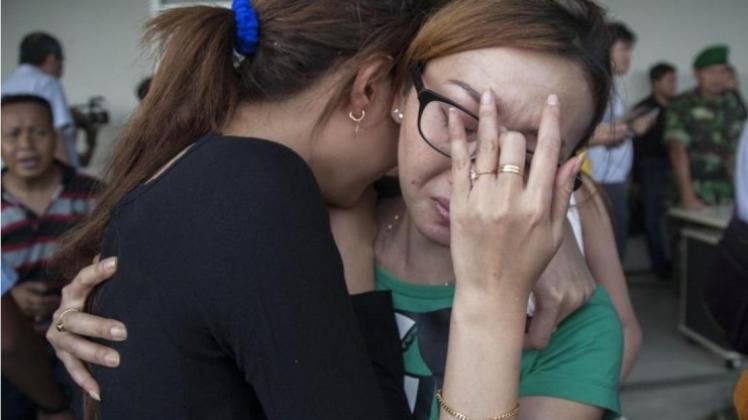Verzweiflung und Trauer: 162 Menschen waren an Bord von Flug QZ8501. 