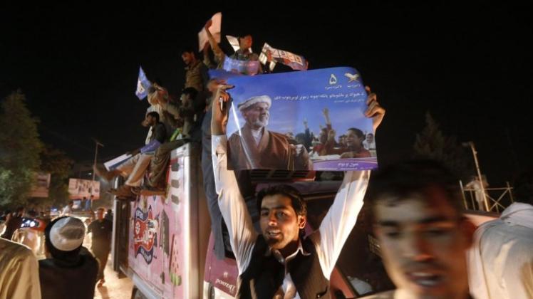 Anhänger von Aschraf Ghani feiern auf den Straßen Kabuls das Wahlergebnis. 