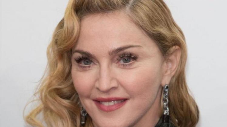 Madonna kam ihren Bürgerpflichten nach. Foto: Jörg Carstensen/Archiv