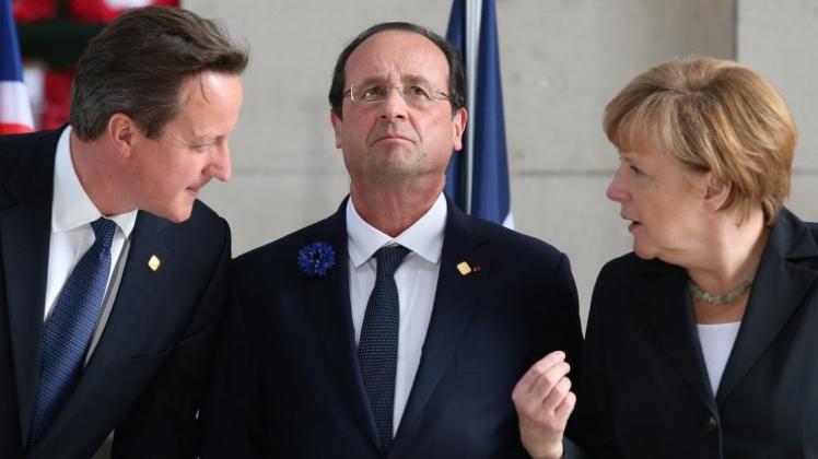 Reagieren auf das MH17-Unglück: David Cameron, Francois Hollande und Angela Merkel (von links). 