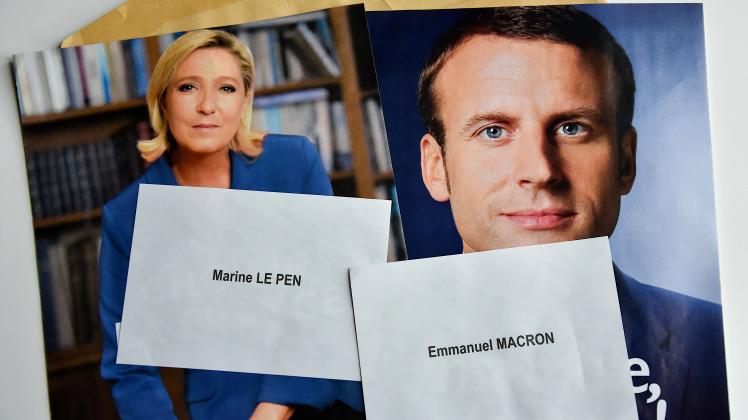 January 10, 2022, France: In this photo illustration, Marine Le Pen and Emmanuel Macron s ballot papers and election pos