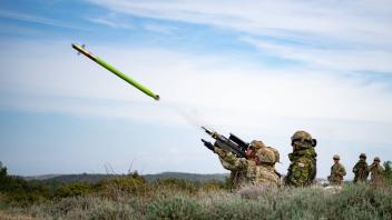 U.S. Army paratroopers assigned to the 173rd Airborne Brigade fire a FIM-92 Stinger during an air defense live-fire exer