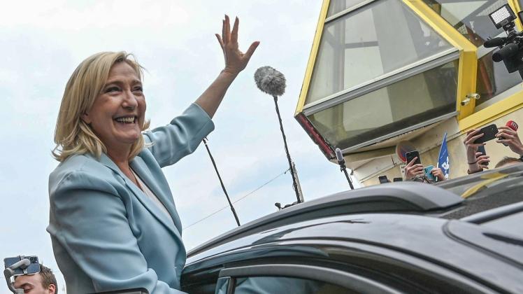 Frankreichs Präsidentschaftskandidatin Marine Le Pen liefert sich eine Stichwahl mit ihrem Kontrahenten Emmanuel Macron. Foto: Denis Charlet/AFP/dpa Frankreichs Präsidentschaftskandidatin Marine Le Pen liefert sich eine Stichwahl mit ihrem Kontrahenten Emmanuel Macron. Foto: Denis Charlet/AFP/dpa