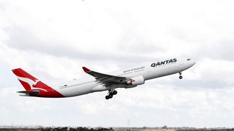 A Qantas plane takes off near the location of Melbourne Airport’s new runway, in Melbourne, Monday, January 31, 2022. (AAP Image/Con Chronis) NO ARCHIVING A Qantas plane takes off near the location of Melbourne Airport’s new runway, in Melbourne, Monday, January 31, 2022. (AAP Image/Con Chronis) NO ARCHIVING