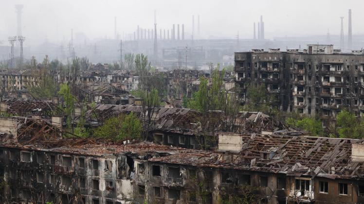 MARIUPOL, UKRAINE - MAY 14, 2022: Buildings destroyed due to hostilities in the city of Mariupol which is under control