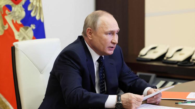 Russian President Vladimir Putin chairs a Security Council meeting via a video link at the Novo-Ogaryovo state residence outside Moscow on May 20, 2022. (Photo by Mikhail METZEL / SPUTNIK / AFP)