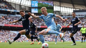 Alexander Zinchenko feiert mit Manchester City den englischen Meistertitel. Foto: Darren Staples/CSM via ZUMA Press Wire/dpa