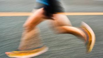 JANUARY 2, 2022 - A runner participates in the 98th Tokyo-Hakone Round-Trip College Ekiden Race in the races third secti
