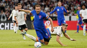 Germany v England - UEFA Nations League - Group A3 - Allianz Arena England s Harry Kane (left) is fouled by Germany s N
