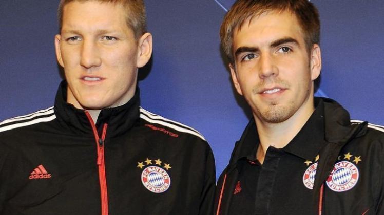 Bastian Schweinsteiger (l) und Philipp Lahm sind wieder ins Bayern-Training eingestiegen. 
