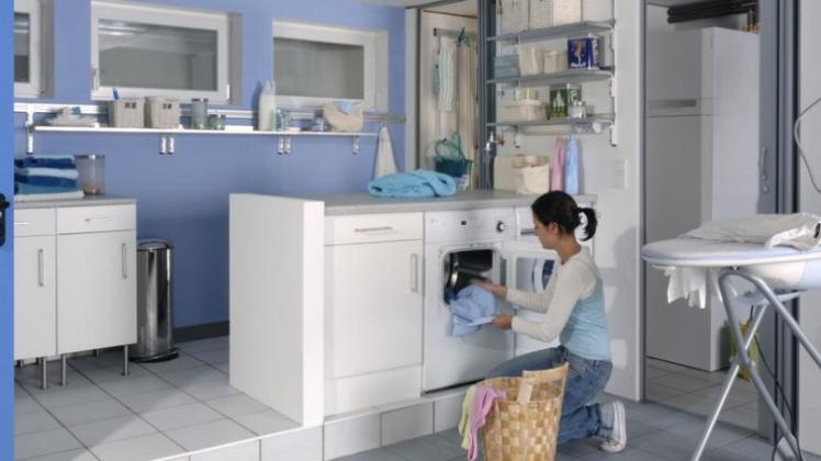 Abgegrenzte Zone: Mit einem Podest wird der Raum klar aufgeteilt, hier etwa in einer Waschküche. 