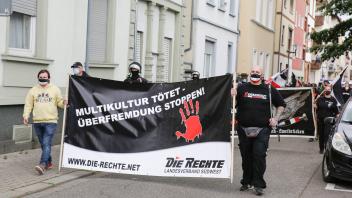Germany: Rightwing  Day of German Future protest Two right-wing protesters carry a banner that reads Multicultural kills