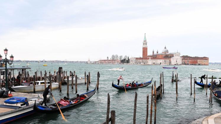 ARCHIV - Tagestouristen in Venedig müssen ab dem nächsten Jahr Eintrittskarten für ihren Besuch der Lagunenstadt kaufen. Foto: Felix Hörhager/dpa