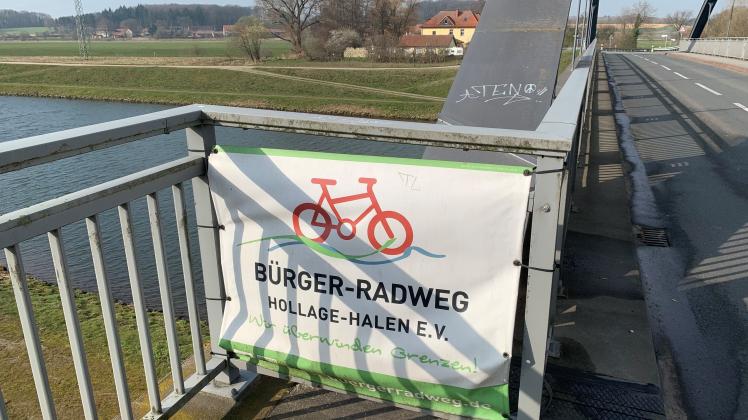 Plakat der Bürgerradweg-Initiative an der L109 zwischen Hollage und Halen, Wallenhorst, März 2021