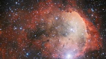 The Wide Field Imager on the MPG/ESO 2.2-metre telescope at the La Silla Observatory has imaged a region of star formation called NGC 3324. The intense radiation from several of NGC 3324&apos;s massive, blue-white stars has carved out a cavity in the surrounding gas and dust. The ultraviolet radiation from these young hot stars also cause the gas cloud to glow in rich colours.