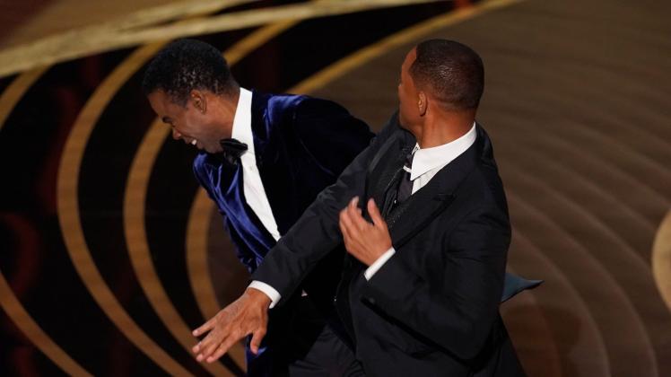 ARCHIV - Will Smith verpasste Chris Rock bei der Oscar-Verleihung eine Ohrfeige. Foto: Chris Pizzello/Invision/AP/dpa