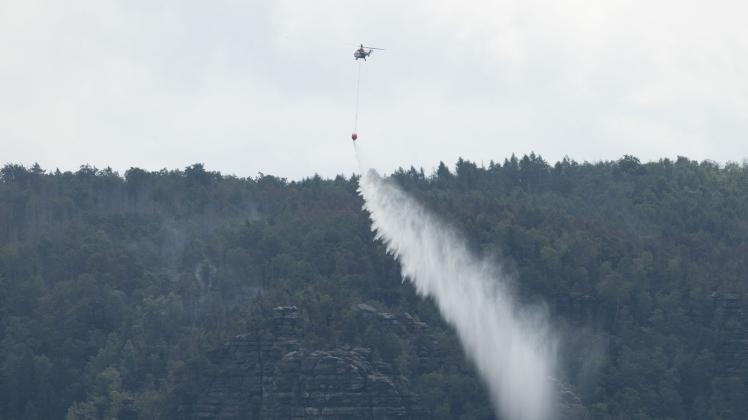 Seit rund einer Woche brennt es im Nationalpark Sächsische Schweiz. Foto: Sebastian Kahnert/dpa