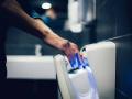 close up. man disinfecting his hands in the bathroom close up. man disinfecting his hands in the bathroom . hygiene and