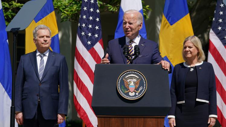 (FILES) In this file photo taken on May 19, 2022 US President Joe Biden, flanked by Sweden’s Prime Minister Magdalena Andersson and Finland’s President Sauli Niinistö, speaks in the Rose Garden following a meeting at the White House in Washington, DC. - The US Senate ratified the entry of Sweden and Finland into NATO August 3, 2022, strongly backing the expansion of the transatlantic alliance in the face of Russia's invasion of Ukraine. (Photo by MANDEL NGAN / AFP)