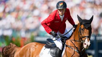 210905 Andre Thieme of Germany with horse DSP Chakaria competes during the individual final on day 5 of the Equestrian