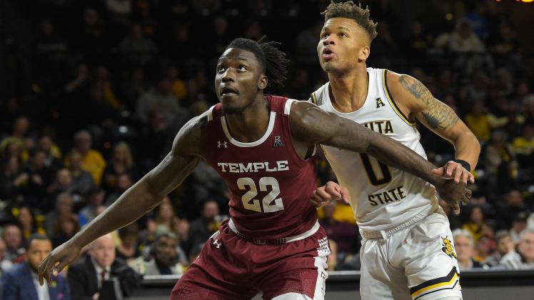 February 27, 2020: Temple Owls forward De Vondre Perry (22) blocks out Wichita State Shockers guard 