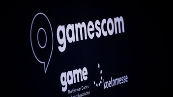 Ein Schriftzug der Gamescom prangt auf einem Schild auf einer Pressekonferenz im Vorfeld der Gamescom 2022. Foto: Rolf Vennenbernd/dpa