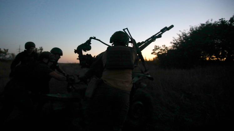 UKRAINE - AUGUAT 24, 2022 - Anti-aircraft gunners of a special air defense unit of the National Guard of Ukraine are se