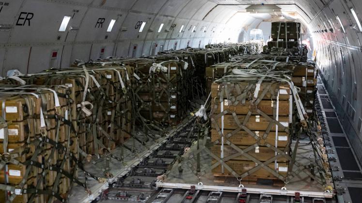 July 21, 2022 - Dover Air Force Base, Delaware, USA - Pallets of ammunition bound for Ukraine are secured onto a commerc