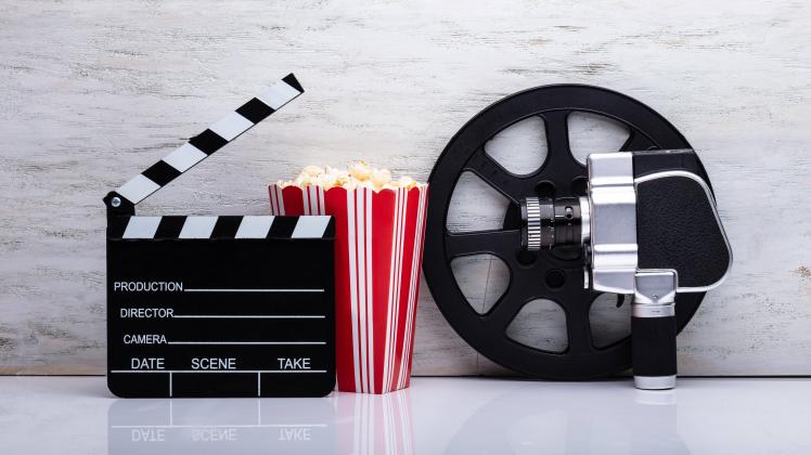 Movie Camera With Popcorn And Clapper Board PUBLICATIONxINxGERxSUIxAUTxONLY Copyright xAndreyPopov