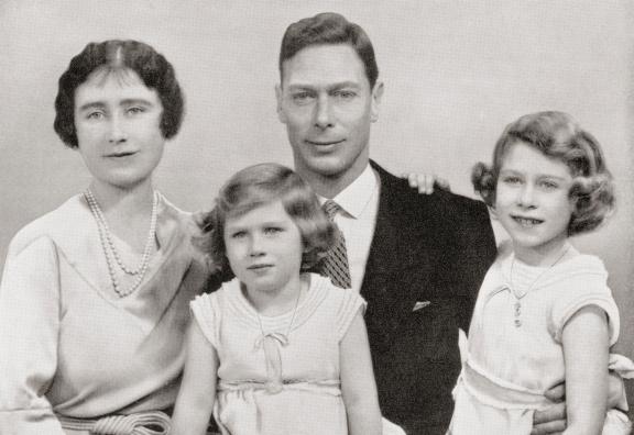George VI with his wife Queen Elizabeth, Elizabeth Angela Marguerite Bowes-Lyon and their children the princesses Margaret and Elizabeth, circa  1937  From The Coronation of their majesties King George VI and Queen Elizabeth, Official Souvenir Programme pu
