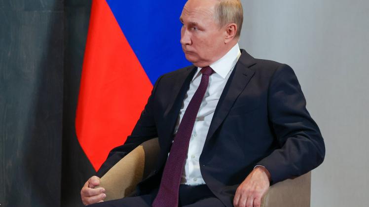 SAMARKAND, UZBEKISTAN   SEPTEMBER 16, 2022: Russia s President Vladimir Putin looks on during a bilateral meeting with