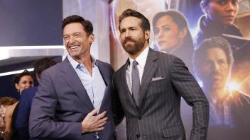 Hugh Jackman and Ryan Reynolds arrive on the red carpet at the Netflix World Premiere of The Adam Project at Alice Tull