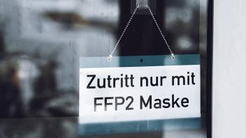 Bavaria, Germany - 12 November 2021: Sign Access only with FFP 2 mask, Wearing a medical protective mask according to FF
