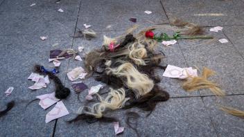 October 2, 2022: In response to the arrest of an Iranian woman by the country s morality police in Tehran, the hair on