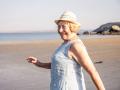 Cheerful senior woman enjoying vacation at beach model released, Symbolfoto, UUF27202
