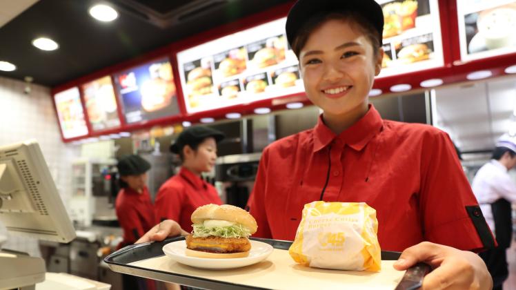 October 26 2016 Tokyo Japan An employee of Japan McDonald s displays new sandwitch Cheeze cutle