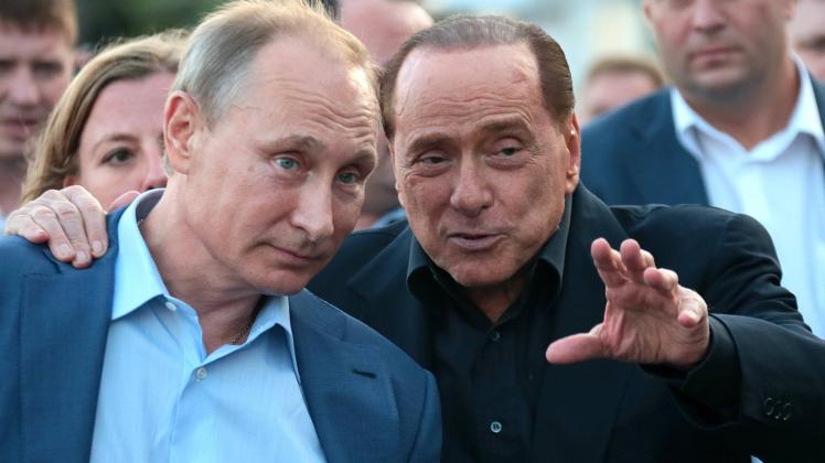 SEVASTOPOL RUSSIA SEPTEMBER 12 2015 Russia s President Vladimir Putin L and Italy s former Pri